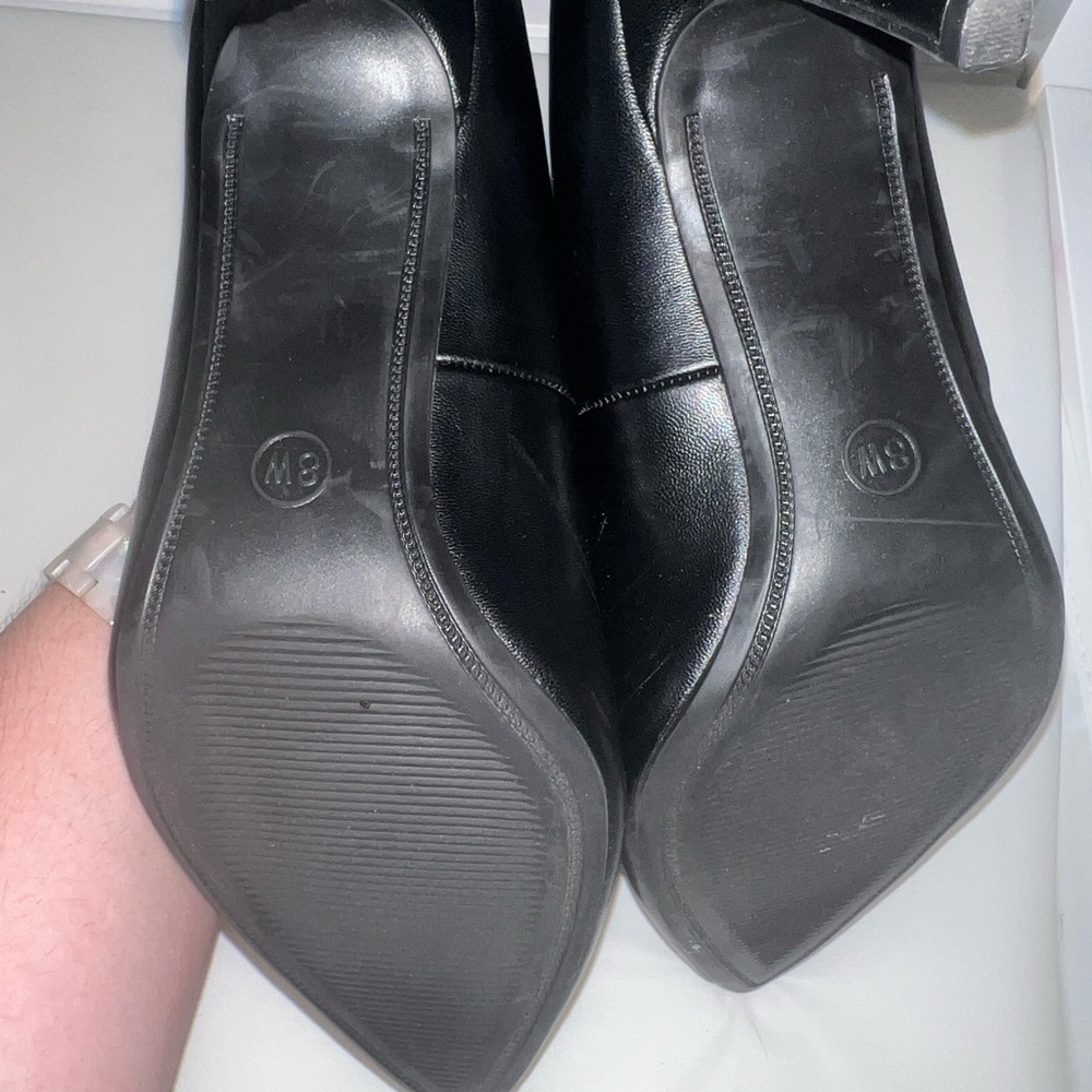 A new day, black high heels